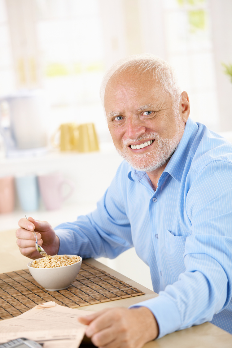 Older Man Eating Cereal